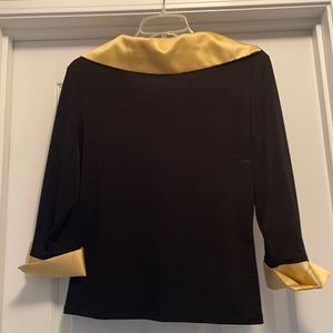 Formal gold and black shirt.